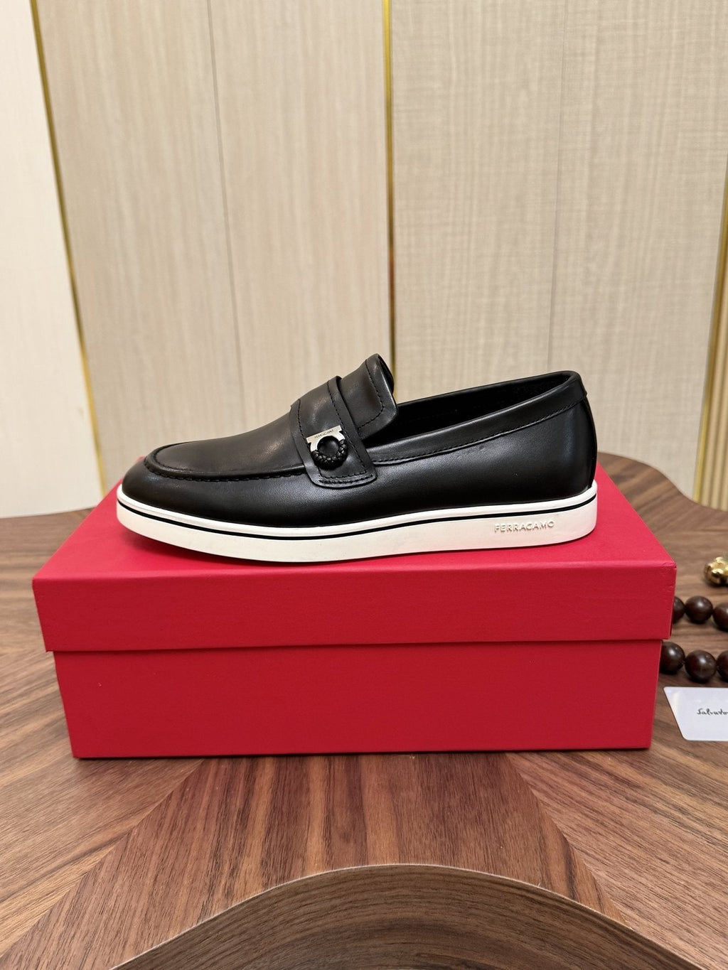 Salvatore Ferragamo Black Loafers with White Soles